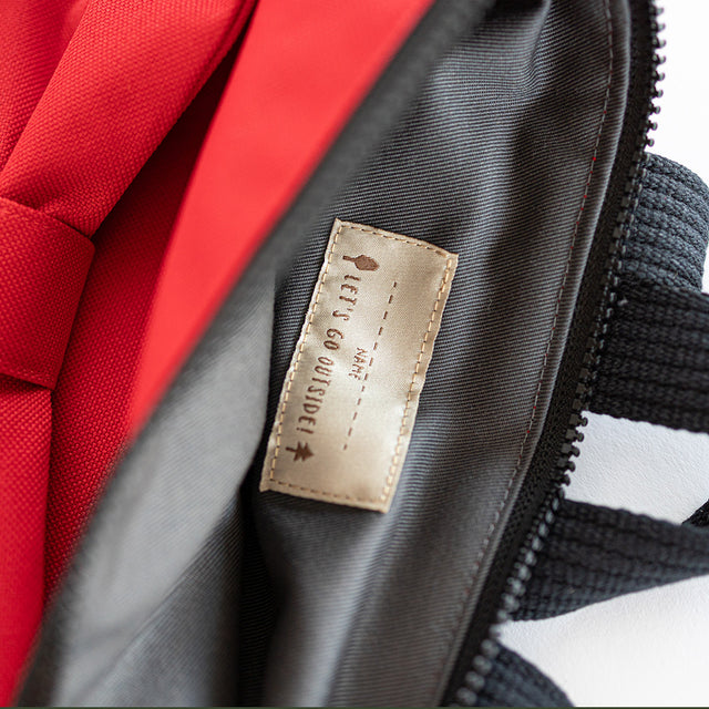 Red Bow Backpack – Waterproof &amp; Playful for Kids by Muni at www.brixbailey.com