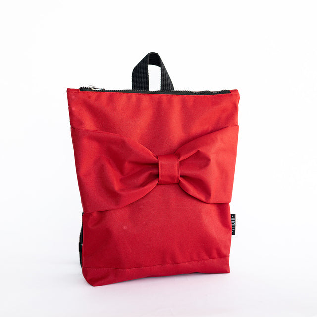 Red Bow Backpack for Kids – Waterproof &amp; Playful Design by Muni at www.brixbailey.com