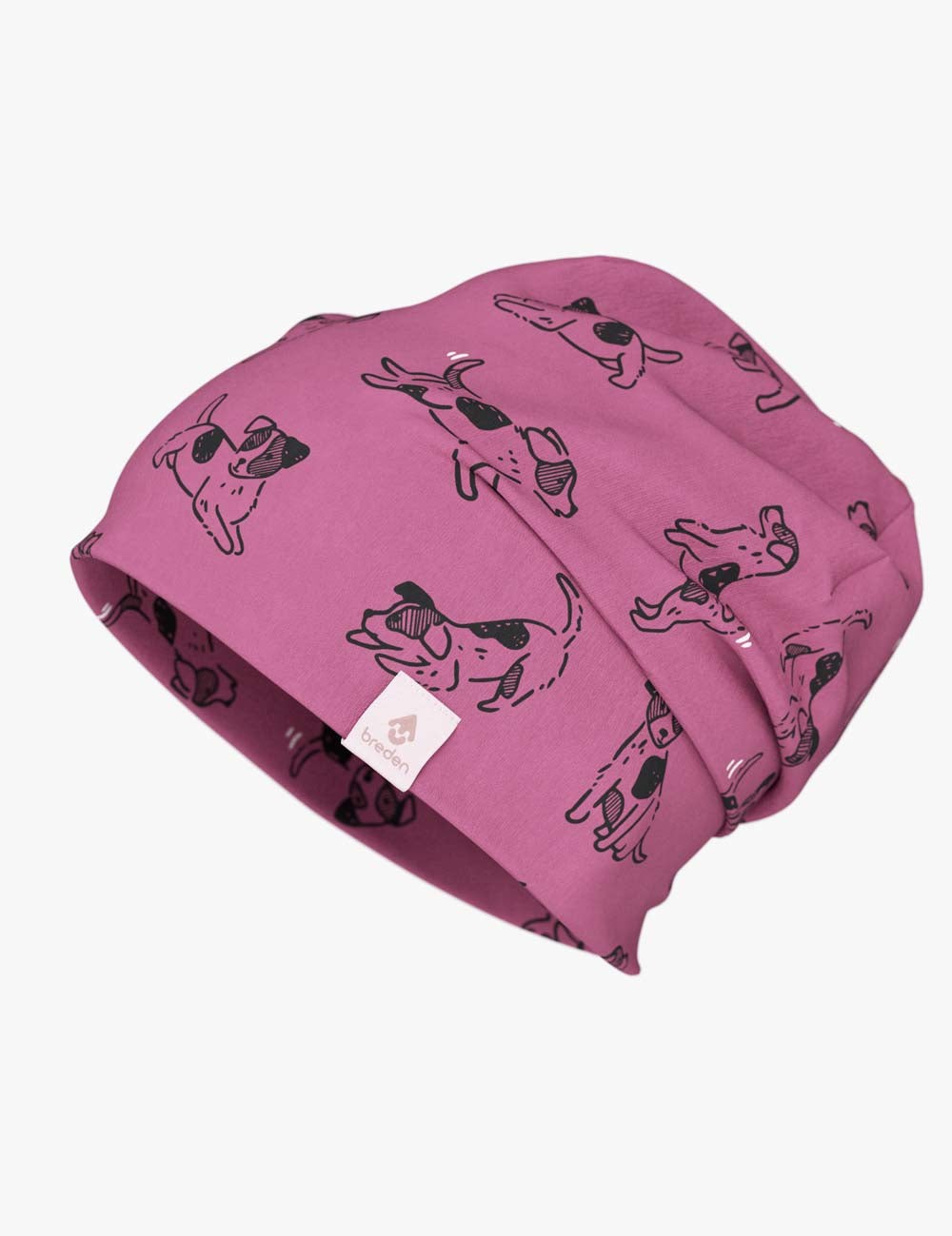 a soft cotton beanie with a pink dog pattern, shown in gentle light for a comforting feel
