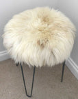 Luxury British sheepskin seat cover, 100% natural round hide, 35cm diameter, cream and light brown, premium hypoallergenic fur, sustainable and machine washable by Wildash London at brixbailey.com