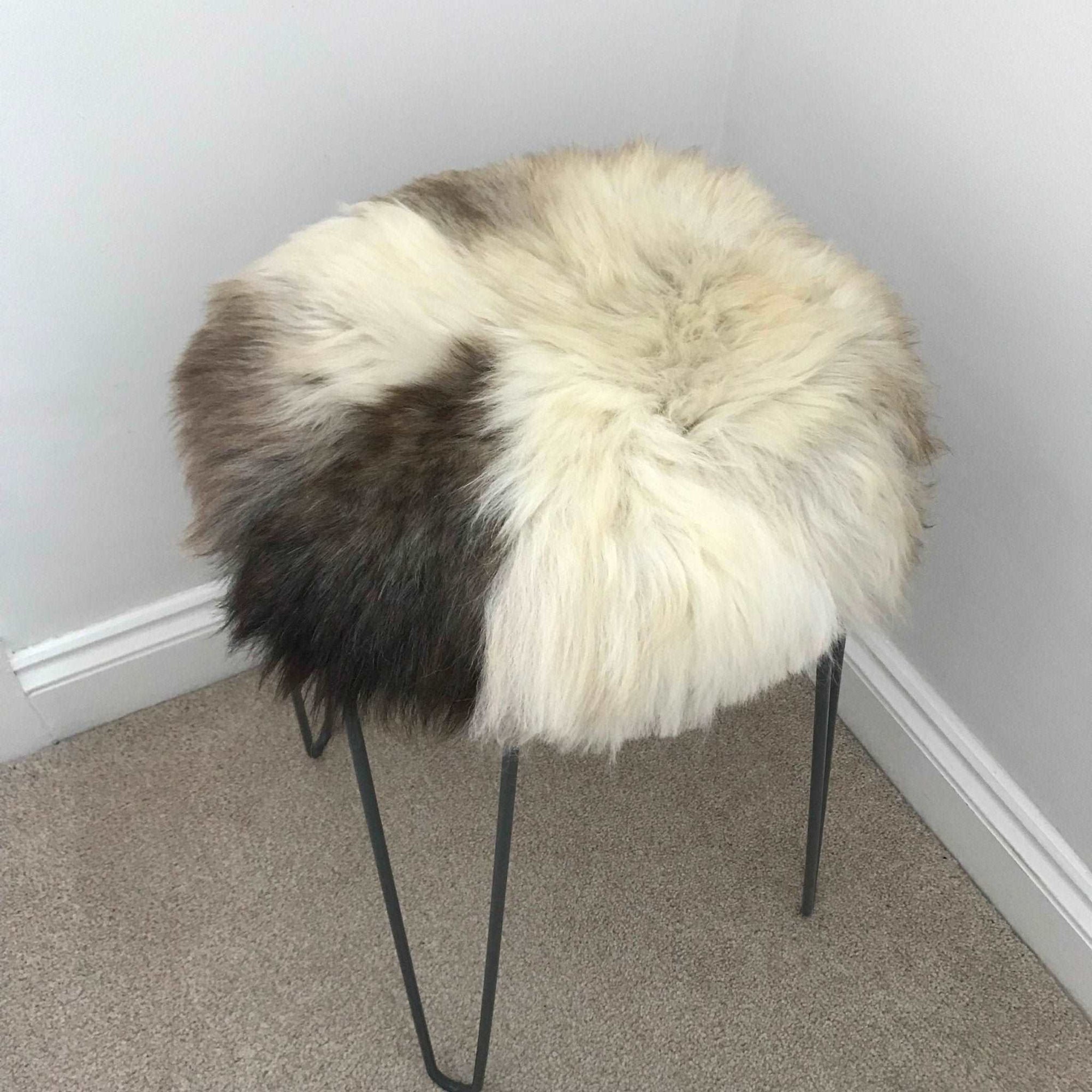 Luxury British sheepskin seat cover, 100% natural round hide, 35cm diameter, cream and light brown, premium sustainable fur by Wildash London at brixbailey.com