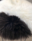 Luxury British sheepskin seat cover, premium 100% natural round hide, white and dark brown, 35cm diameter, hypoallergenic, sustainable by Wildash London at brixbailey.com