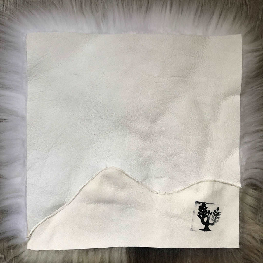 Premium British sheepskin seat cover, luxury natural hide, lights cream and brown rare breed mix, 37cm square, hypoallergenic, sustainable by Wildash London at brixbailey.com