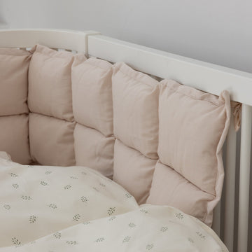 Premium kapok baby bumper in birchbark rose, hypoallergenic organic cotton, fits Sebra baby and junior bed, luxury crib bumper for safe sleep by Ella James at brixbailey.com