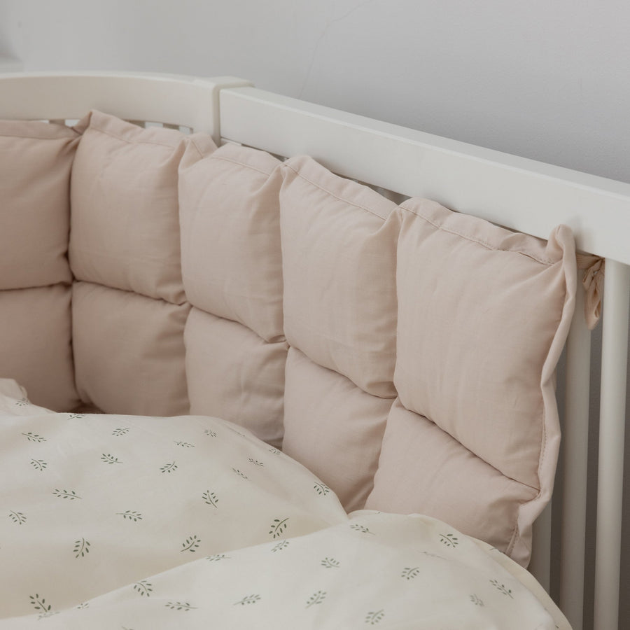 Premium kapok baby bumper in birchbark rose, hypoallergenic organic cotton, fits Sebra baby and junior bed, luxury crib bumper for safe sleep by Ella James at brixbailey.com