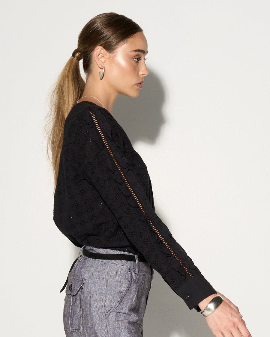 Luxury black ruffled blouse with eyelet fabric, puff shoulders, and lace inserts, edgy romantic top by GILD at brixbailey.com