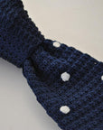 navy blue skinny knitted tie with white polka dots