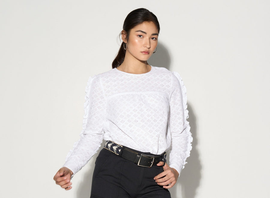 Black ruffled blouse, premium cut-out eyelet fabric, romantic puff sleeve top with lace inserts, stylish and edgy by GILD at brixbailey.com