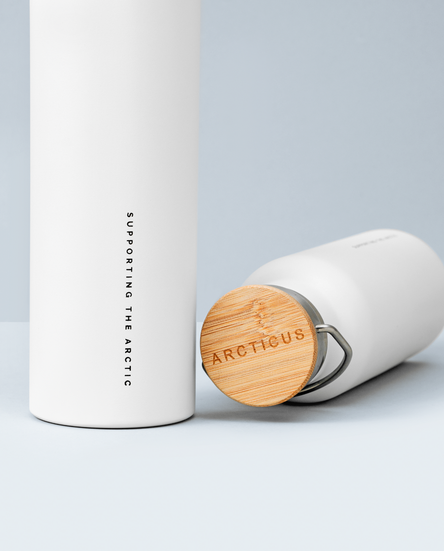 Premium Arctic Bottle, double-wall vacuum-insulated stainless steel, eco-friendly bamboo lid, keeps drinks hot or cold, leak-proof, BPA-free by Arcticus at brixbailey.com