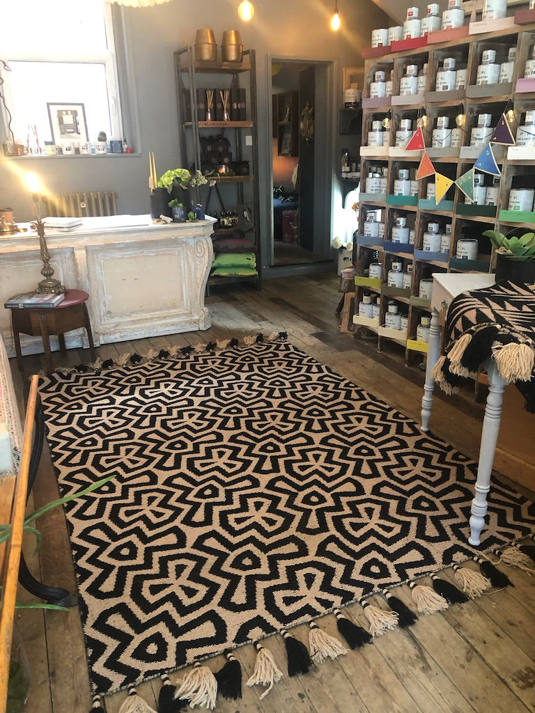 Premium monochrome flat weave rug, handmade in India with pure wool, stylish geometric design and tassel trim, neutral tones by Maria Starling Design at brixbailey.com
