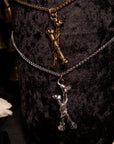 Gold Tethered Remains Bones Necklace