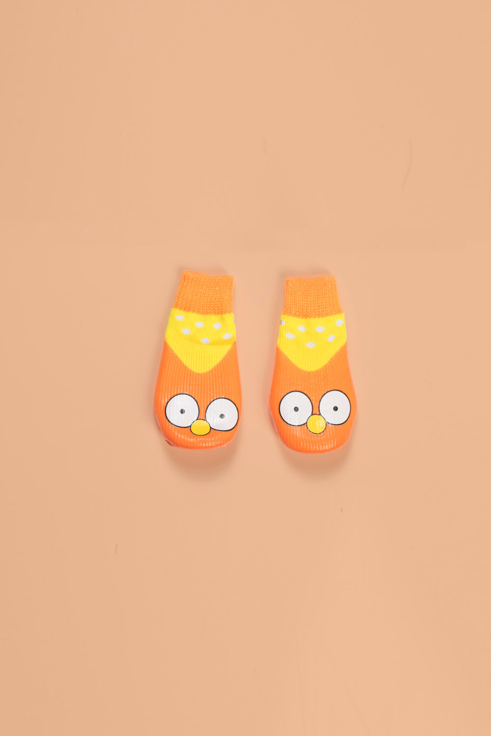 Premium non-slip dog socks, cute paw protectors for clean dry paws, best-selling traction socks for slippery surfaces by Body and I at brixbailey.com