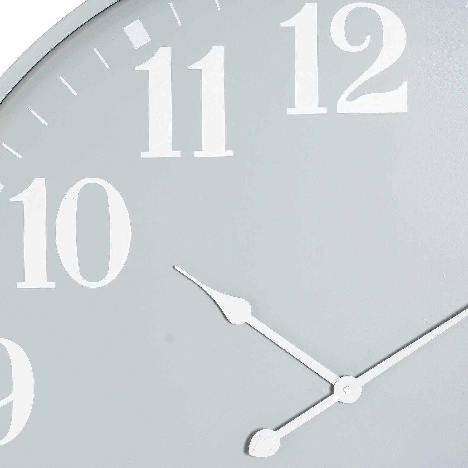 80cm grey metal wall clock with industrial minimalist design, casting dynamic light patterns by Sostter at brixbailey.com