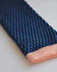 navy blue skinny knitted tie with powder pink tip