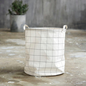 Black and white squares premium laundry bag, stylish smart storage with handles, wired top and bottom, foldable for compact storage by Ella James at brixbailey.com