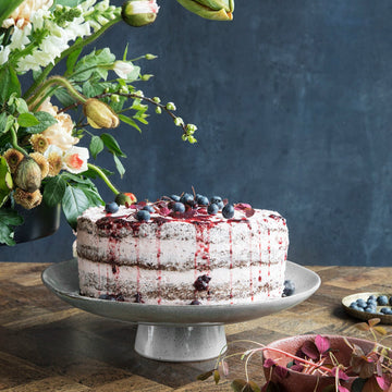 Luxury glazed stoneware cake stand, elegant blue-grey centerpiece, unique handcrafted design, 32cm diameter, dishwasher safe by Ella James at brixbailey.com