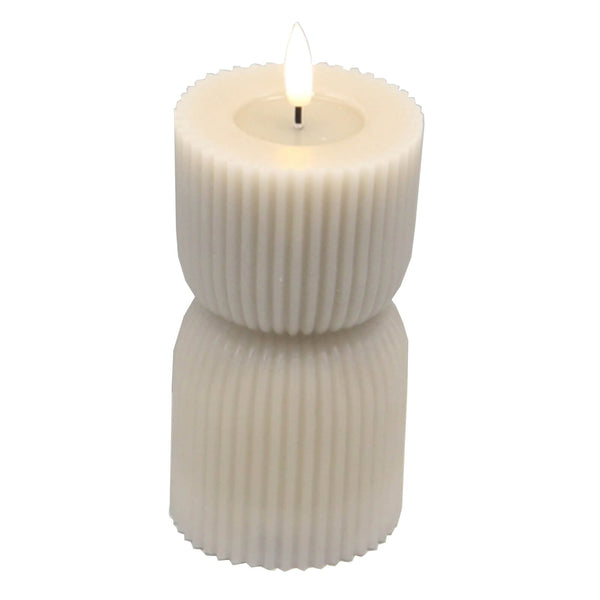 Handcrafted stone-textured LED candle, 24cm tall, natural tone, flame-free ambiance for home decor. by Sostter at brixbailey.com