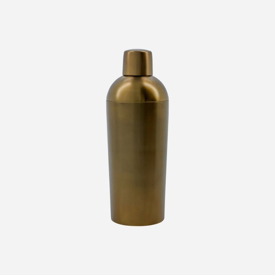 Premium six-piece antique brass barware set, stylish stainless steel cocktail shaker, strainer, stirrer, measuring cup, ice bucket, tongs by Ella James at brixbailey.com
