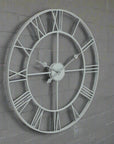 Grey Skeleton Wall Clock Oversized Metal Roman Numeral Design