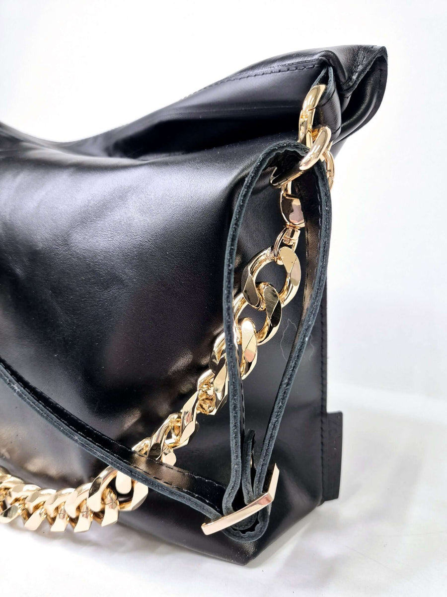 Black Leather Handbag with Metallic Accents, Crossbody