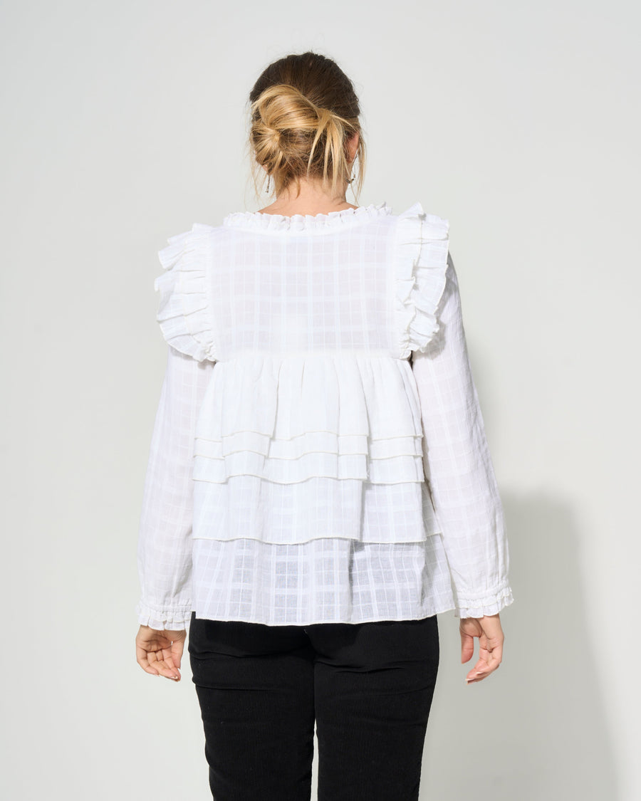 Luxury cream tiered blouse with ruffled shoulders, romantic feminine style, soft textured cotton, best-selling womens top by GILD at brixbailey.com