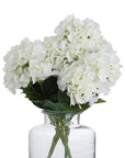 Lifelike creamy white hydrangea bouquet with realistic petals, perfect for timeless home decor and floral arrangements. by sostter at brixbailey.com