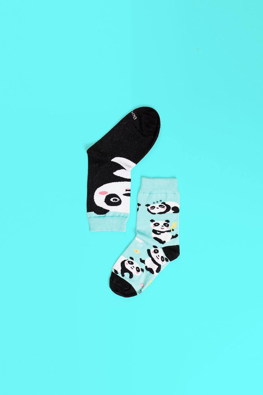 Luxury unisex panda mismatched socks, premium cotton blend, trendy animal print, best-selling novelty gift by Body and I at brixbailey.com