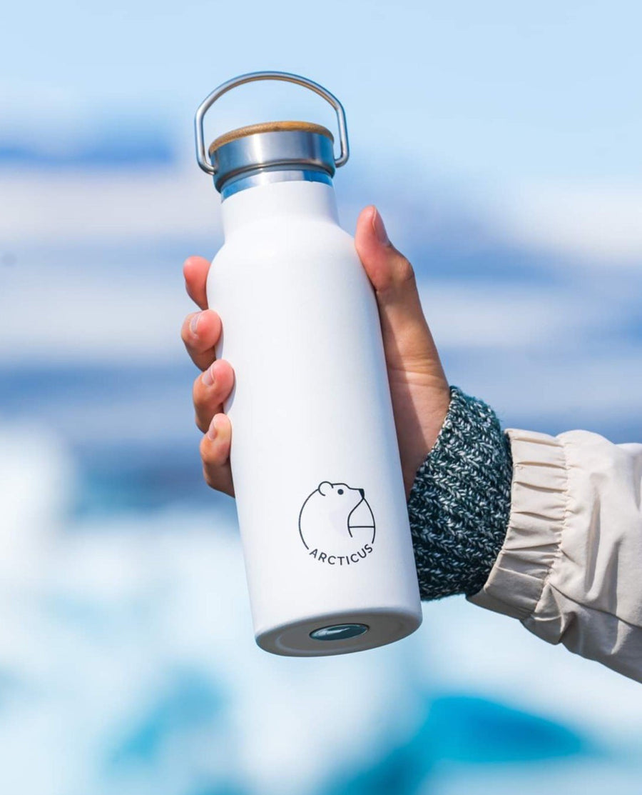 Premium Arctic Bottle, double-wall vacuum-insulated stainless steel water bottle, eco-friendly bamboo lid, keeps drinks hot or cold, leak-proof, BPA-free by Arcticus at brixbailey.com