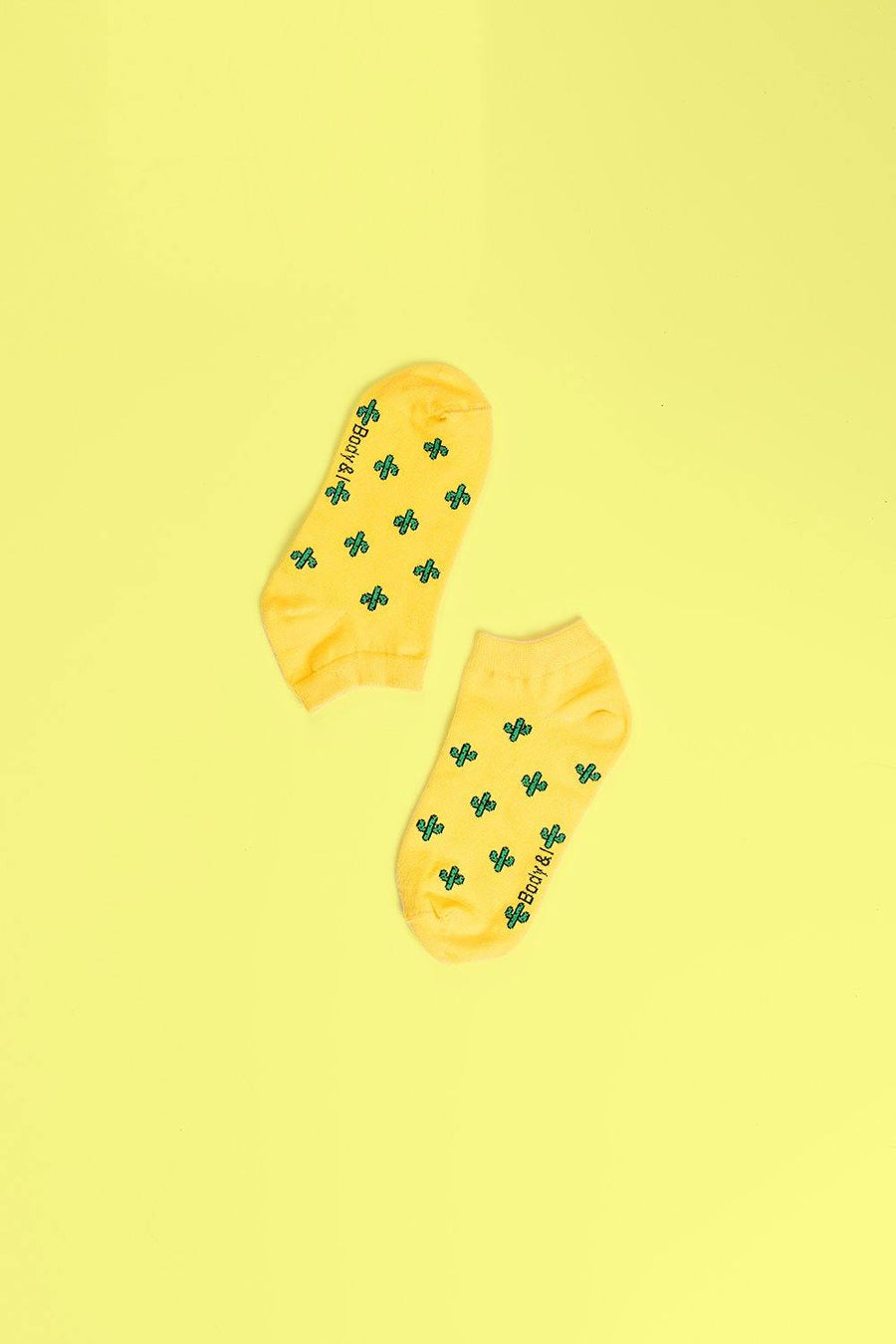 Cactus yellow patterns short ankle socks, luxury cozy autumn-inspired socks with green succulent leaves, best-selling trendy unisex socks by Body and I at brixbailey.com