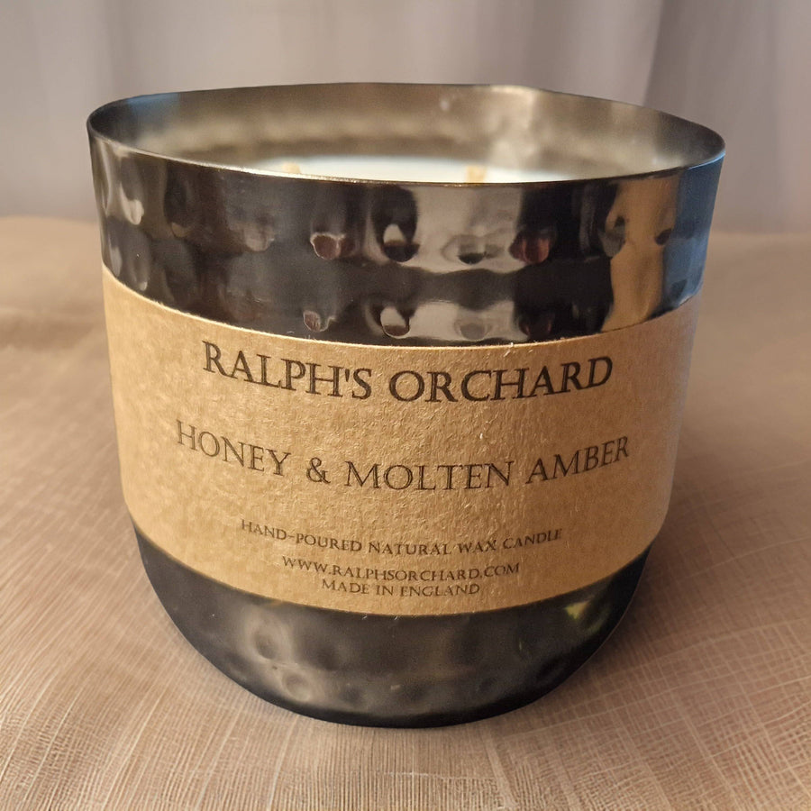 Premium 2-wick dimpled black candle, hand-poured luxury soy wax, elegant home decor, best-selling classic fragrance, cruelty-free eco-friendly by Ralph's Orchard at brixbailey.com