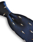 navy tie with penguin design