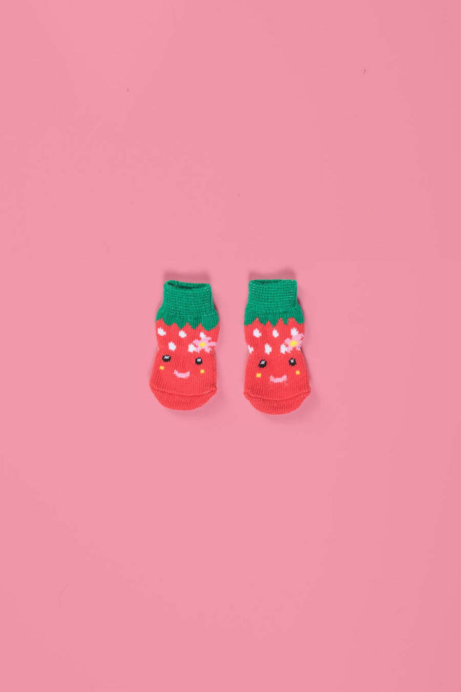 Premium non-slip dog socks, paw protectors for clean dry paws, stylish strawberry print, best-selling pet accessories, cotton blend traction socks for hardwood floors by Body and I at brixbailey.com