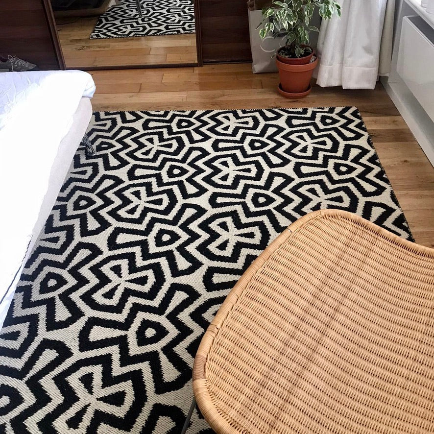 Luxury monochrome flat weave rug, handmade in India, premium pure wool, geometric design, stylish tassels, trending neutral tones by Maria Starling Design at brixbailey.com