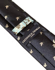 navy blue mens tie with white dove embroidered peace design