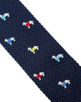 navy blue knitted tie with embroidered dog design