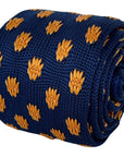 navy blue knitted tie with golden sunflower embroidered design