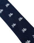 navy blue knitted tie with white embroidered bicycle bike design