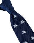 navy blue knitted tie with white embroidered bicycle bike design
