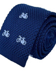 navy blue knitted tie with white embroidered bicycle bike design