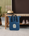 Cream Chow Chow Chic: Aloof Floof Roll-Top Backpack