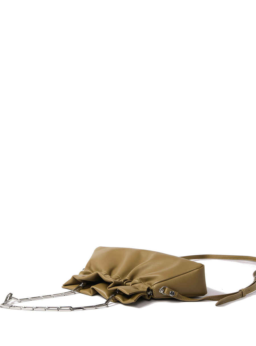 Luxury Mila Bag in smooth mustard green leather, elegant silver hardware, stylish cloud-like shape, premium handcrafted accessory by Bob Oré at brixbailey.com