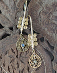 Temple Bloom Filigree Drops- Mandala-Inspired Brass Earrings with Spiral & Gem Detailing.