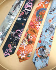 Rust orange coloured Silk Tie, 'Eden' tropical meadow print
