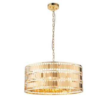 Luxury gold hexagonal pendant light, handcrafted metal disc design, warm shimmering glow, adjustable chain, modern glam ceiling fixture by Ella James at brixbailey.com