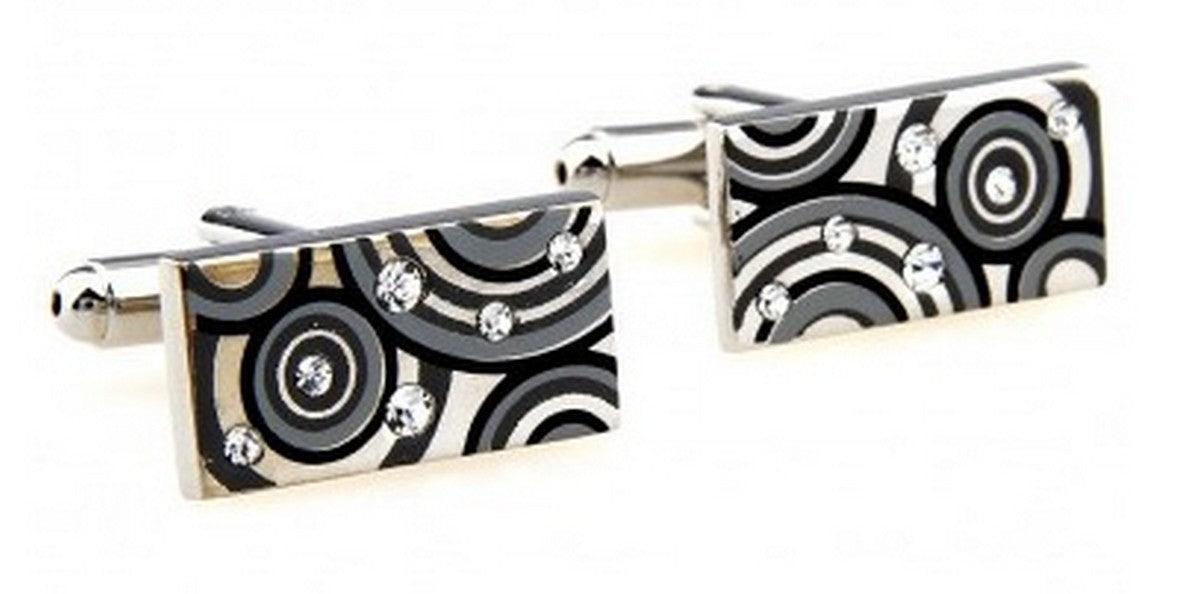 silver, black and grey circular cufflinks