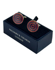 red and blue cufflinks in a  circular target design