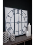 Large silver Roza panelled wall clock with metal frame, modern design, and easy-to-read numerals for home decor by sostter at brixbailey.com