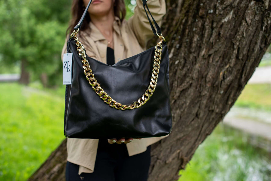 Black Leather Handbag with Metallic Accents, Crossbody