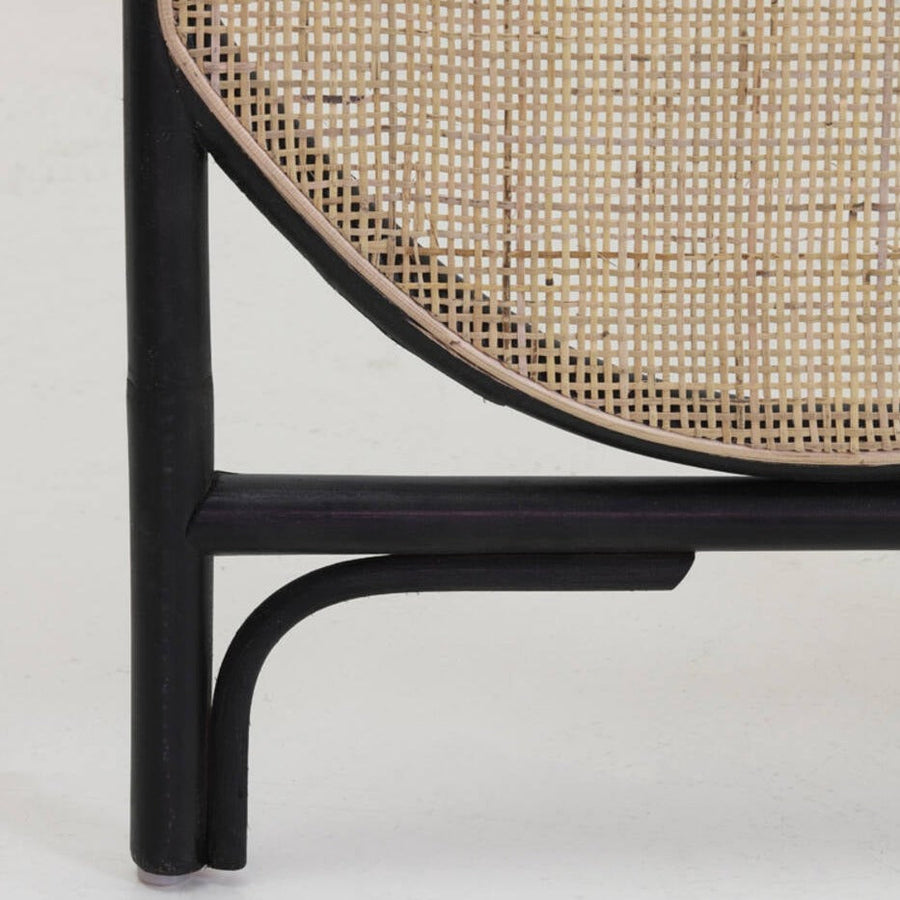 Luxury handcrafted rattan room divider, elegant webbed design with black trim, stylish three-panel folding screen by Ella James at brixbailey.com