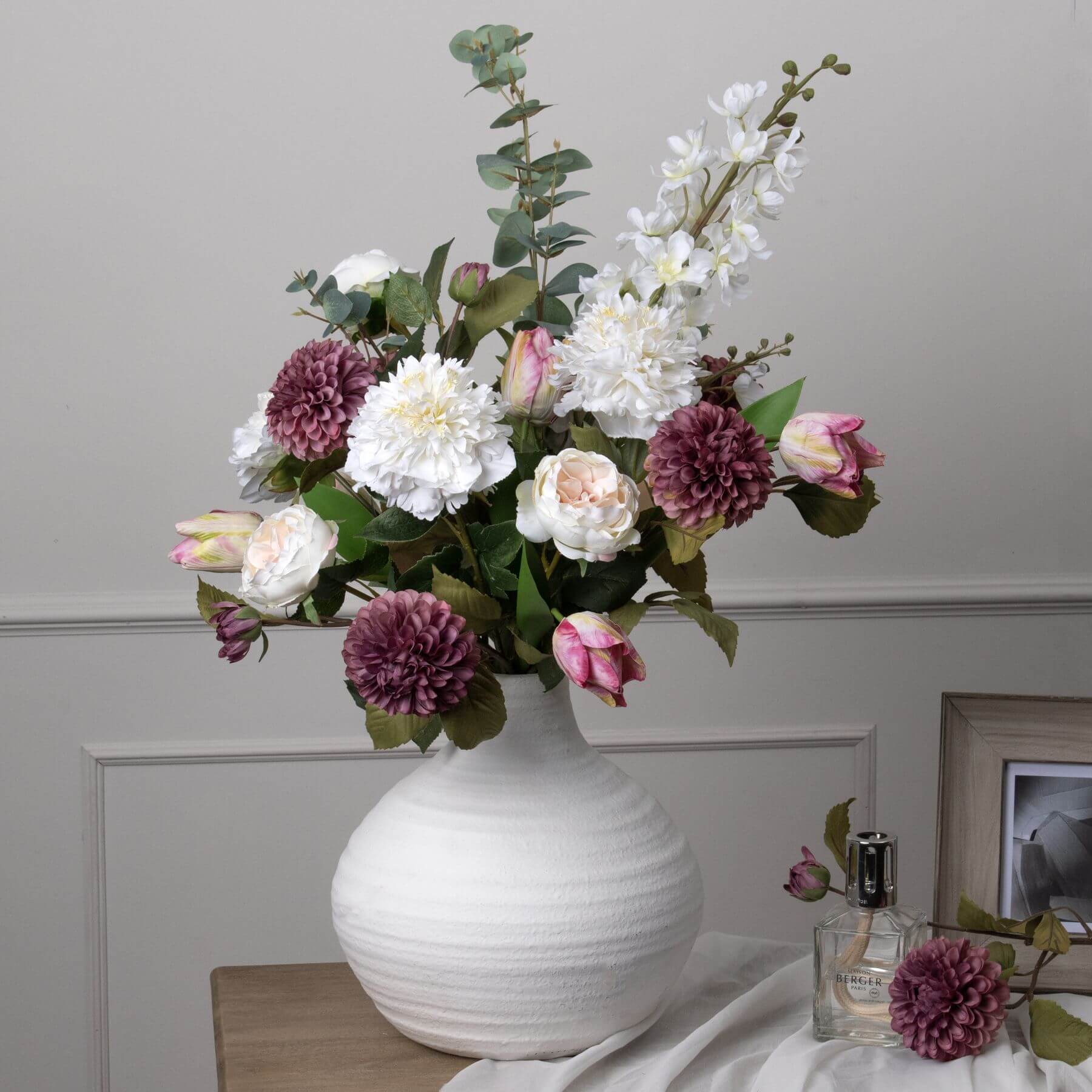 White artificial delphinium stem with realistic clustered florets, 84cm tall, perfect for elegant home floral arrangements. by sostter at brixbailey.com